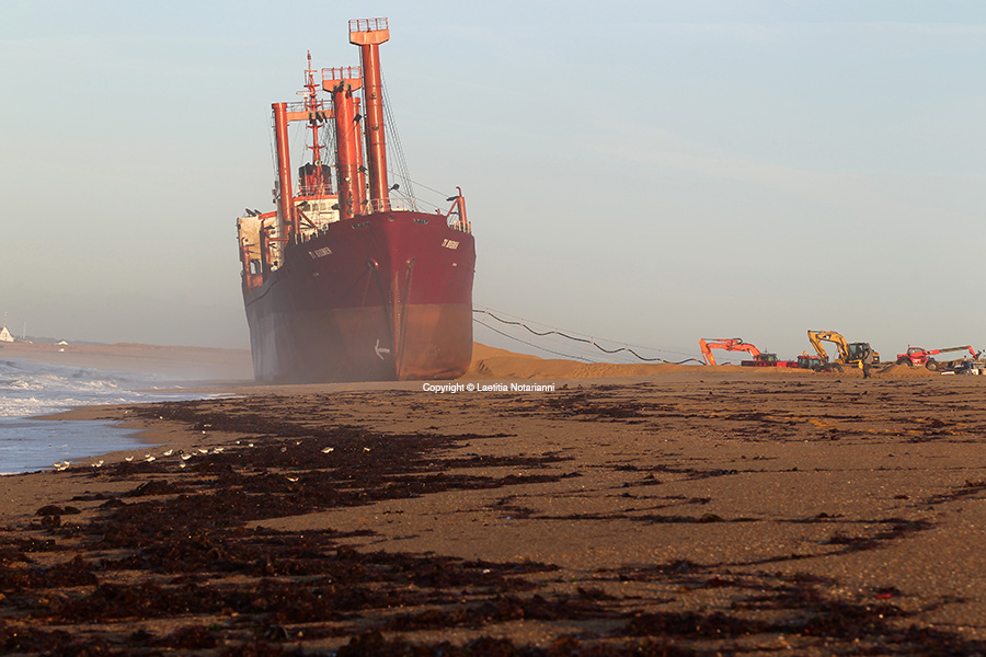 The TK Bremen cargo ship ran aground, spilling oil off the coast of France's northwestern region of Brittany and lies stranted on Kerminihy beach in Erdeven, France, on December 16, 2011. Photo by Laetitia Notarianni/ABACAPRESS.COM